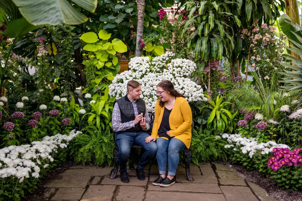 gay couple celebrate their botanical surprise proposal in toronto