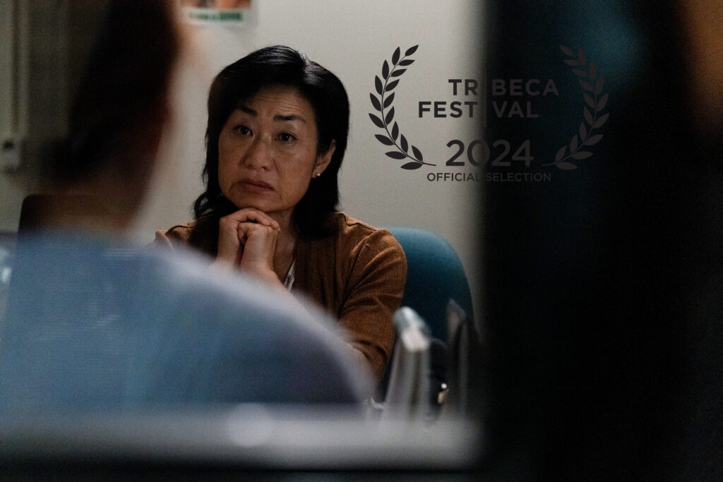 Jean Yoon looks pensive as she speaks with Britt Lower in the film Darkest Miriam