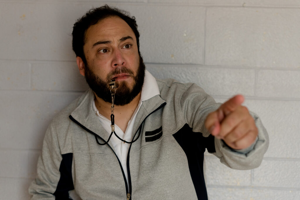 Rodrigo Fernandez-Stoll point out and whistles as the sports teacher in kids CBC series Detention Adventure 3