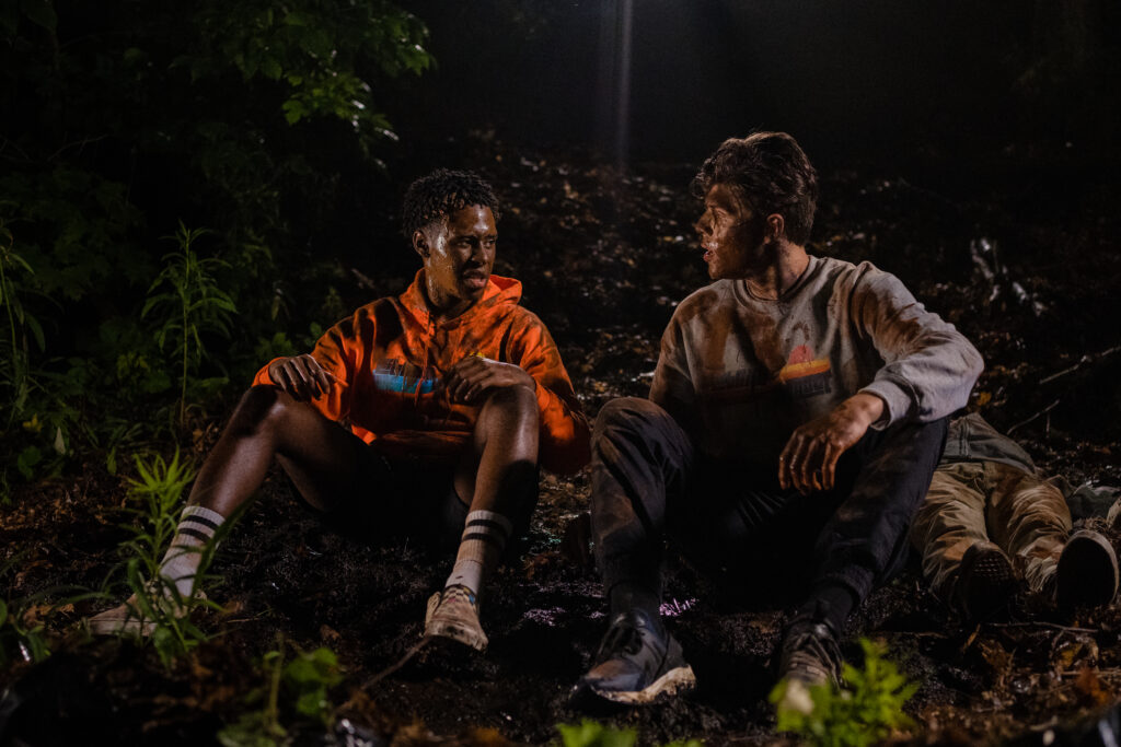 Dante Prince and Tomaso Sanelli slid down a muddy hill during an adventure in an episode of detention adventure