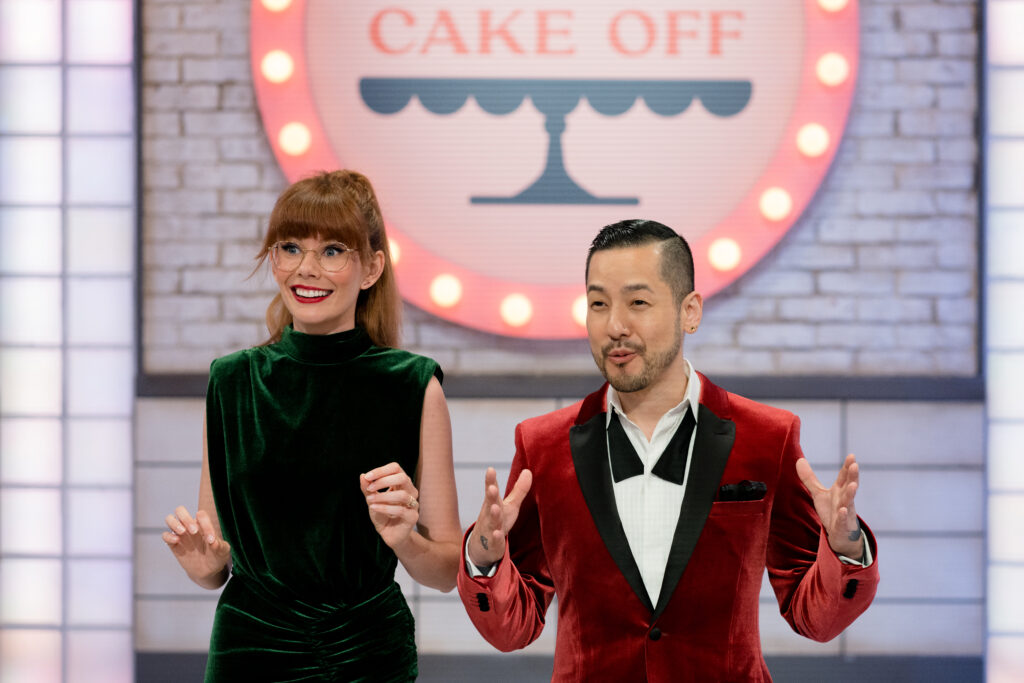 Hosts of Cross Country Cake Off Mary Berg and Chef Andrew Han talk to the contestants