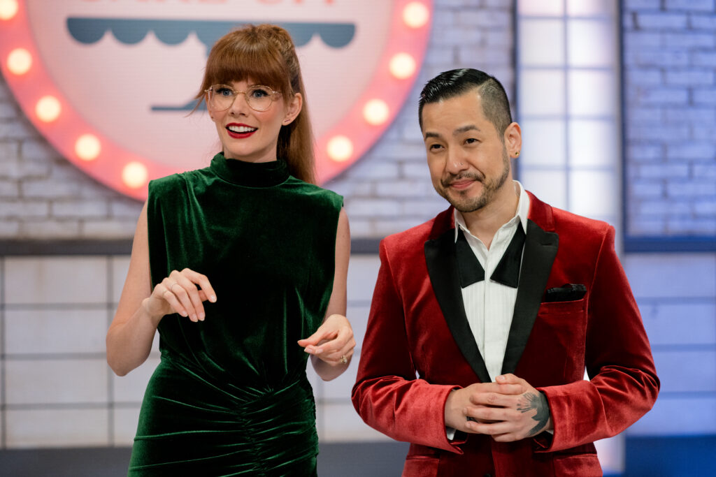 Hosts of Cross Country Cake Off Mary Berg and Chef Andrew Han talk to the contestants