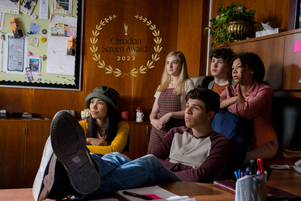 Unit Stills photo by Lauren Newman showing Tomaso Sanelli, Ali Prijono, Jack Fulton and Simone Miller in a detention adventure 3 scene sitting and standing together in their principles office.