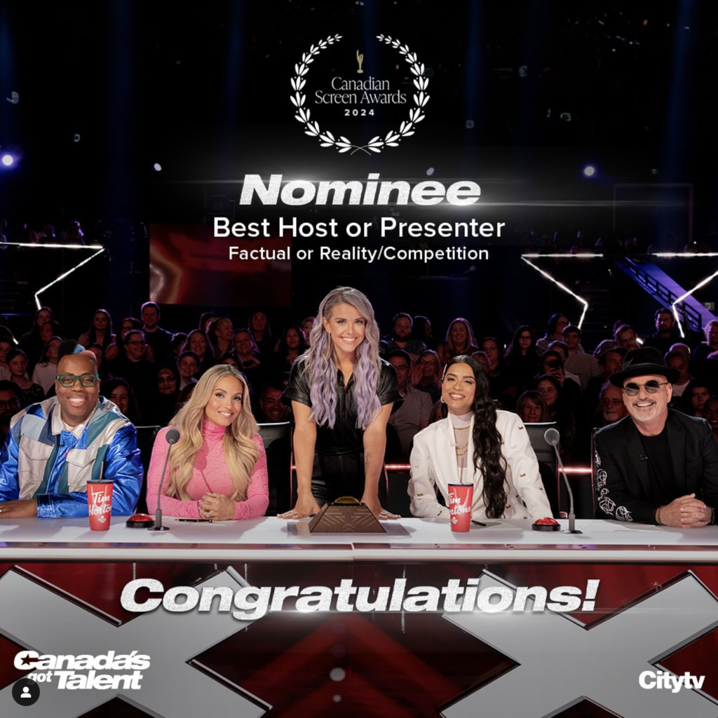 Howie Mandel, Lindsay Ell, Kardinal Offishall, Lillu Singh, and Trish Stratus pose for a photo at the judges desk in Canadas Got Talent live with Rogers