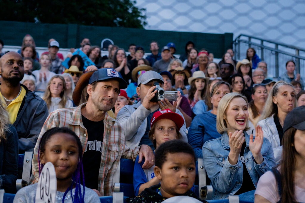 Luke Wilson is part of crowd watched baseball match in movie You Gotta Believe