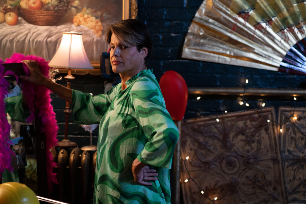 Alexandra Billings loos around in a scene from the movie Queen Tut