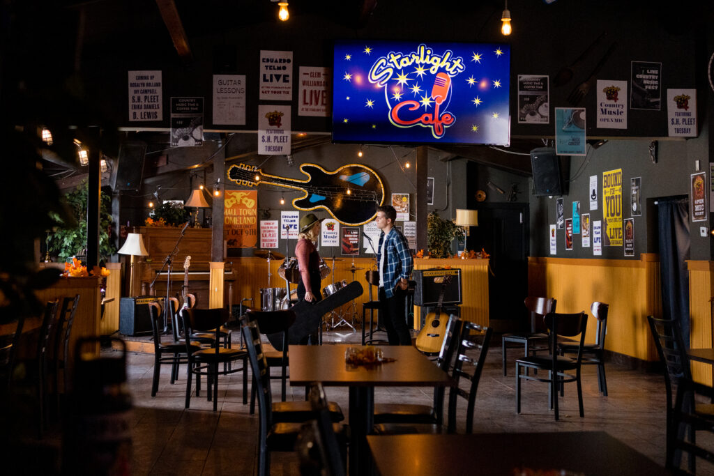 Lanie Mcauley on stage singing with guitarist David Pinard