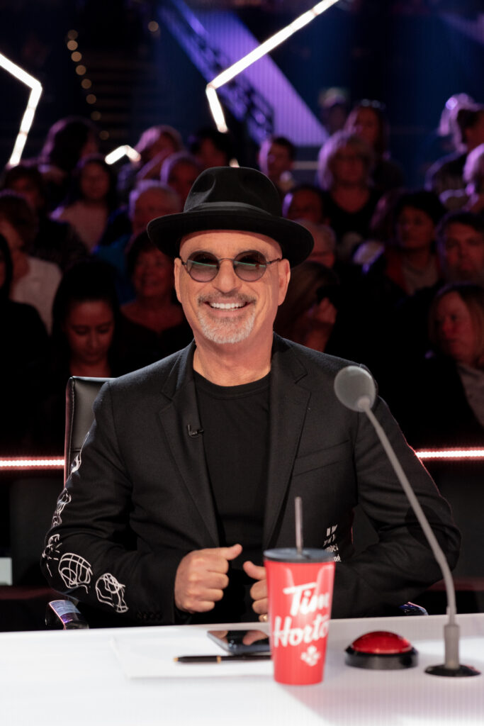 Howie Mendel poses to camera on Canadas Got Talent season 4