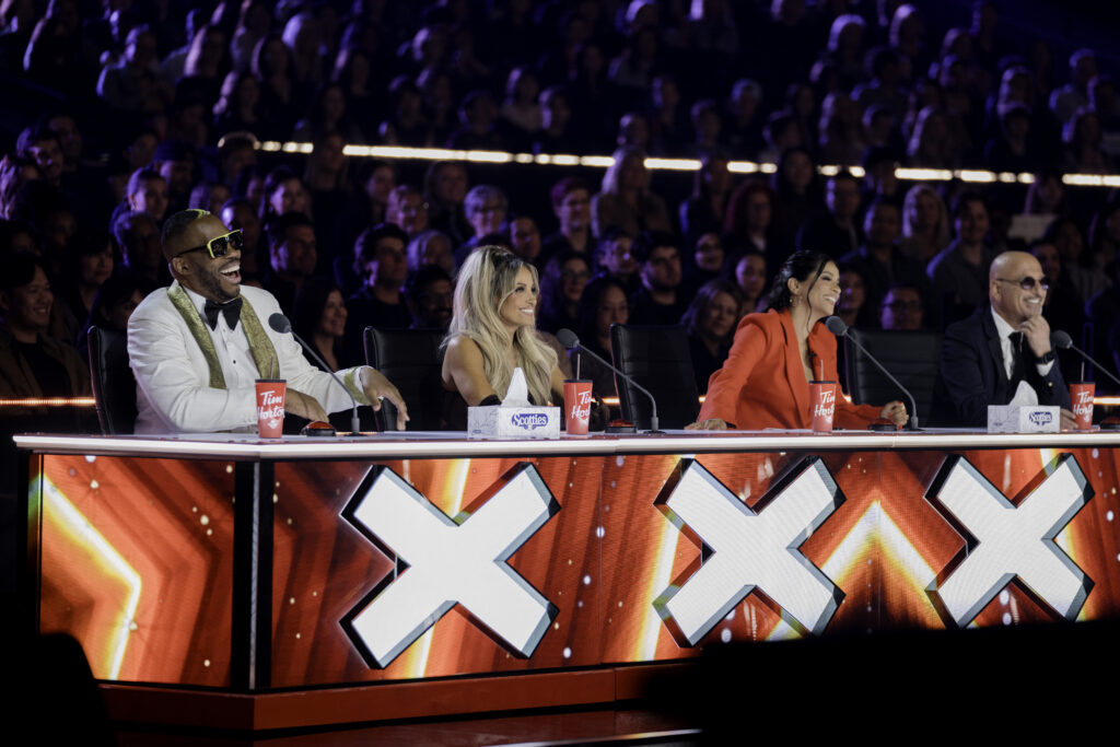 Howie Mandel, Lindsay Ell, Trish Stratus, Lilly Singh, Kardinal Offishall applaud at judges desks during Canadas Got Talent season 4