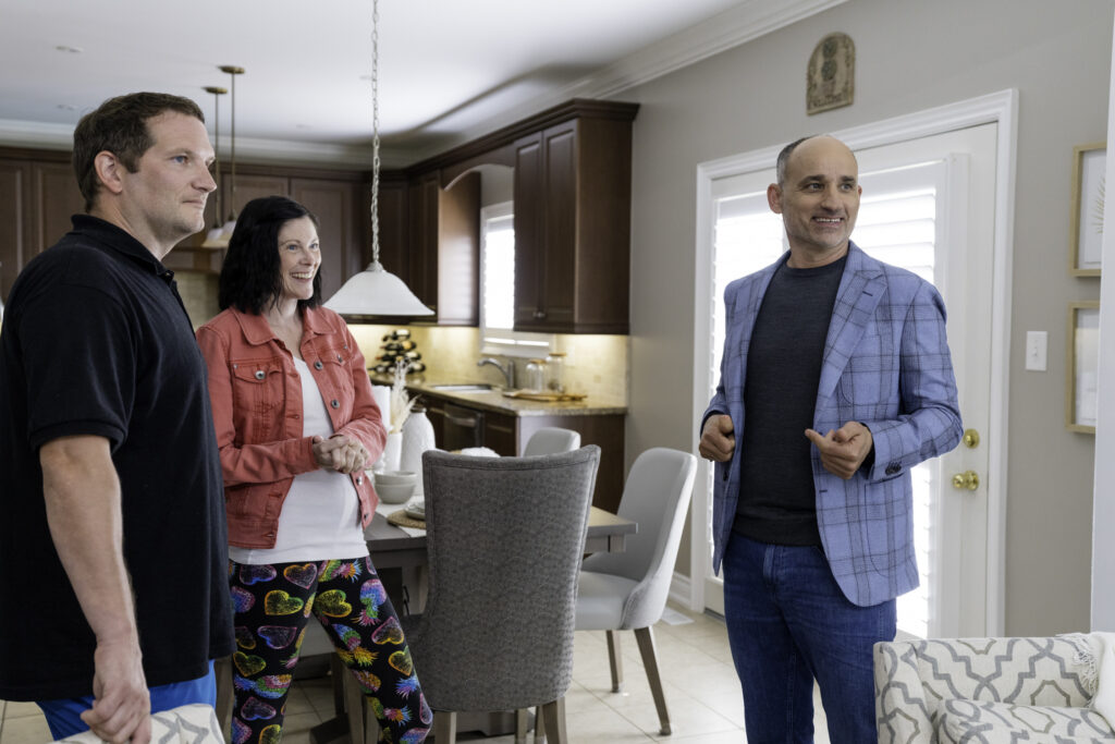 David Turner with home owners during tour in renovated Love it or List it house